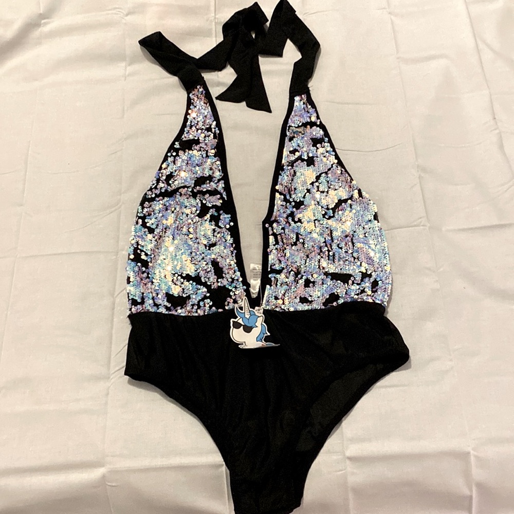 Sparkle like the ultimate rave queen in this Sequin bodysuit!